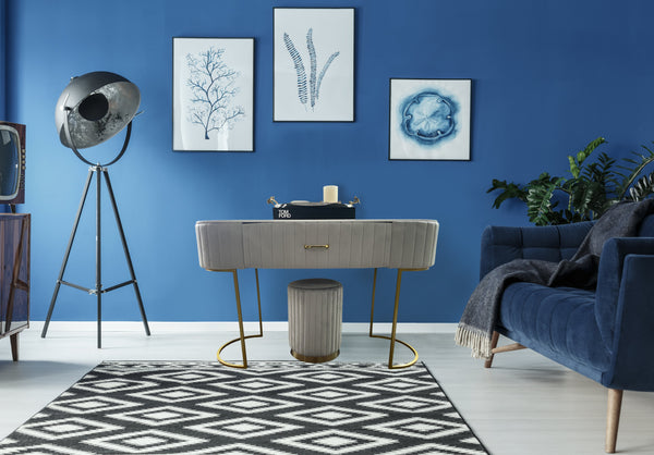 Harper velvet upholstered table with faux marble top